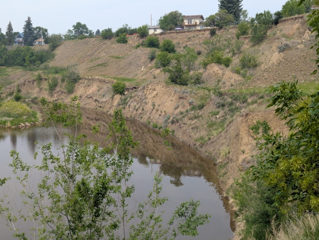 River eroding valley toe, triggering landslide movements